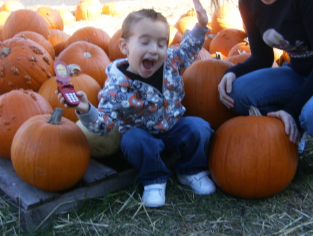 Ryan striking a pose at the pumpkin patch.