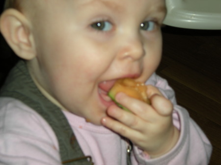 Lillie eating Cantaloupe