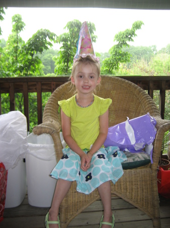 Mia at her birthday party, age 5