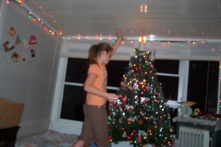 SARA DECORATING TREE.