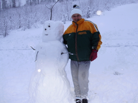 Snowman in the mountains