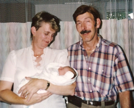 Holding first grandson 1993