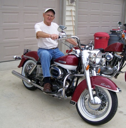 Dad on my 77 harley  82 years old