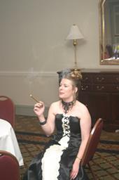 Is it ok to smoke a cigar in an evening gown?