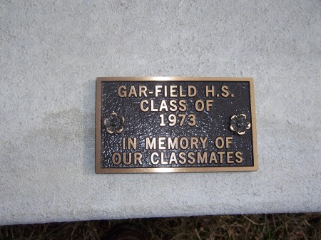 Close up of Brass Dedication on Memorial Benc