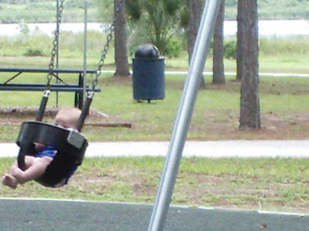 Tristen on the swing at the park