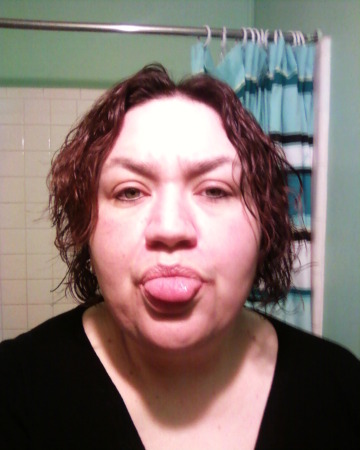 Me after new cut and perm. Being silly!