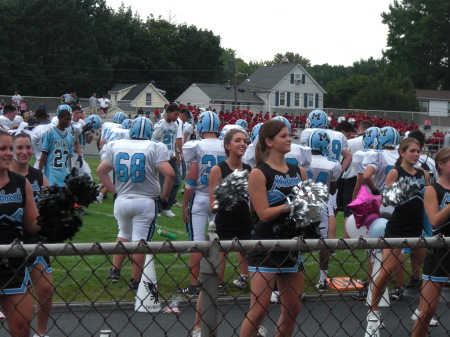 Valerie cheerleading-back row to right of #68