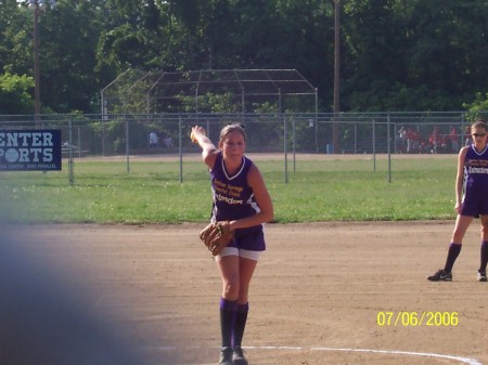 Whitney pitching softball.