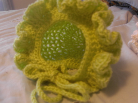 Close up of Baby girl ruffled hat....