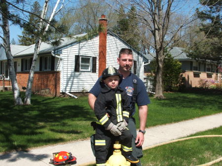 posing for firefighter memorial statue