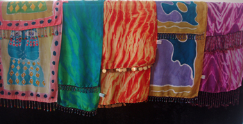 Hand dyed and/or painted silk scarves.