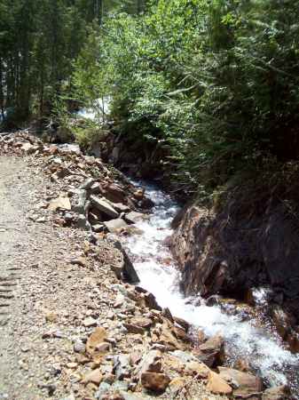 The rushing waters of a mountain stream.