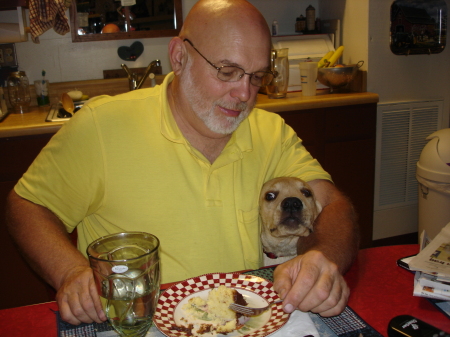 Don eating with his buddy, Clancy