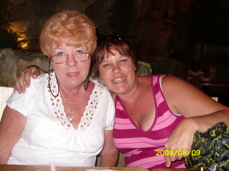 Me & Mom at T-Rex in Disney  July 2009