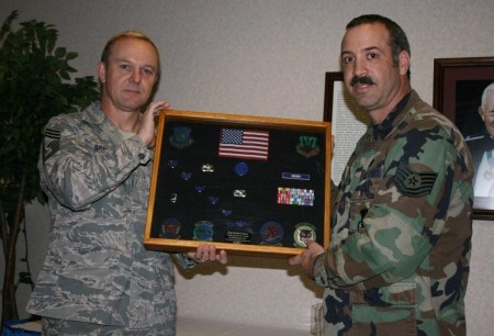 Chief Brady presenting shadow box