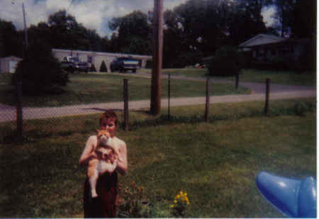 Seth (my 7 year old grandson) with Fat Cat.