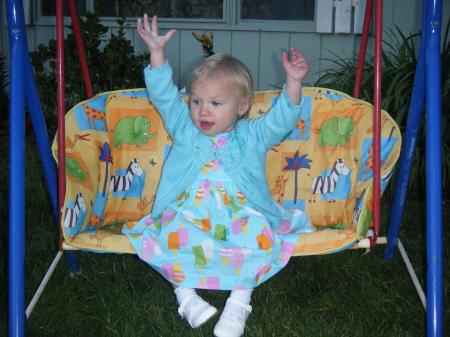 Zoe on her new swing that I bought her