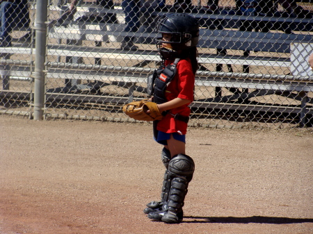 My daughter, the catcher, in Little League