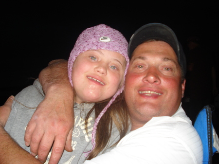 daddy and cierra at the campfire