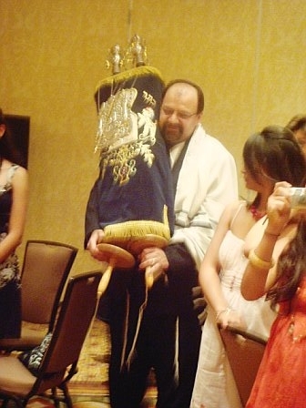 I get to carry the Torah scrolls