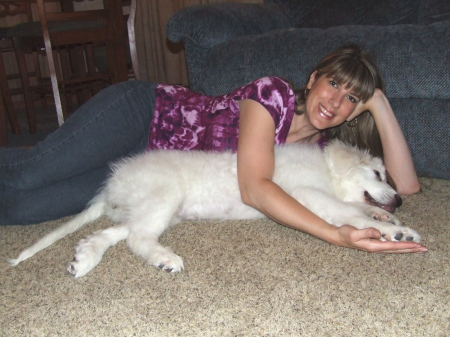 My wife & Our Great Pyrenees Puppy 4 months.