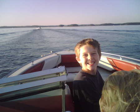 logan in boat