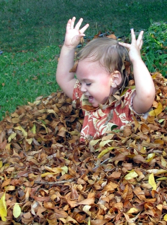 Alanna Buried In Leaves