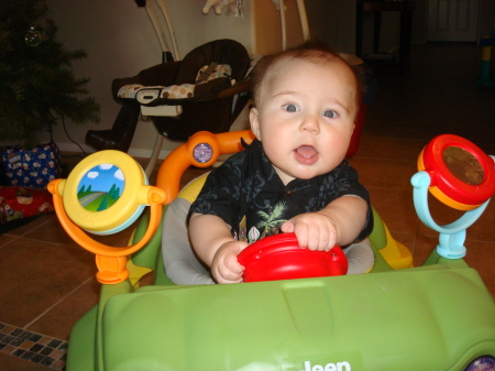 Grandson Gavin tearin up the road (kitchen)