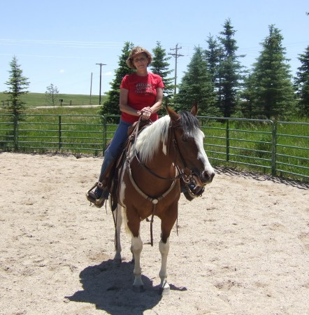 Cowgirl at heart and her trusty steed