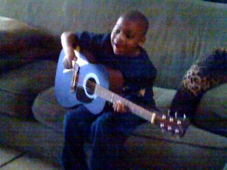 MY SON PLAYING HIS GUITAR