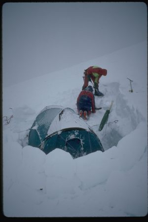 Mt Logan East Ridge - Digging out camp 5-1996