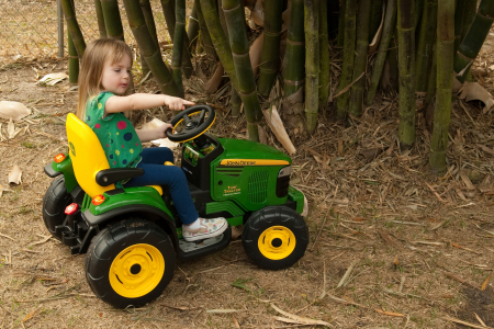 Kiersten with her very own John Deere