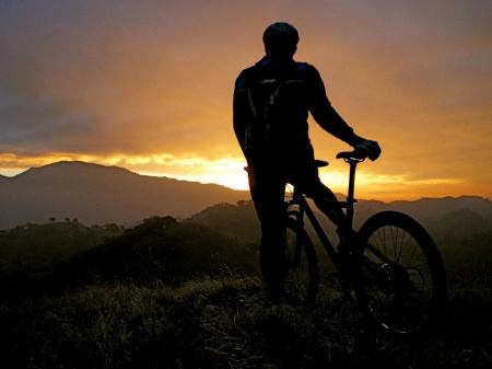 Jeff and bike at sunrise