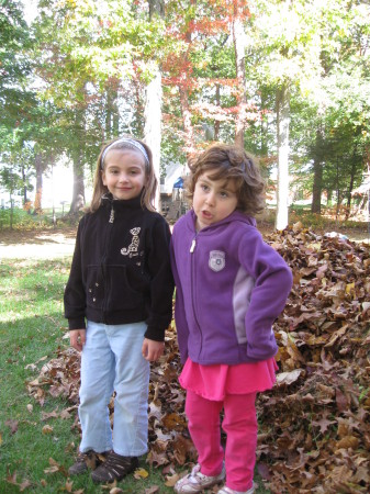 Rachael and Sarah in backyard leaves