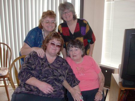 Mom on her 80th with her three daughters