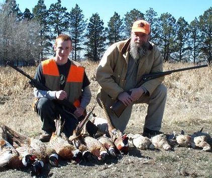 Wade and Dad hunting near our home in SD