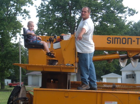 My man-Eric and Justin on daddys' work truck.