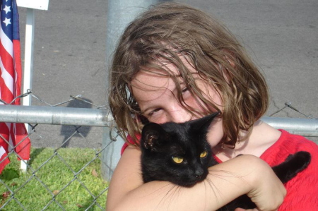 My granddaughter and her cat