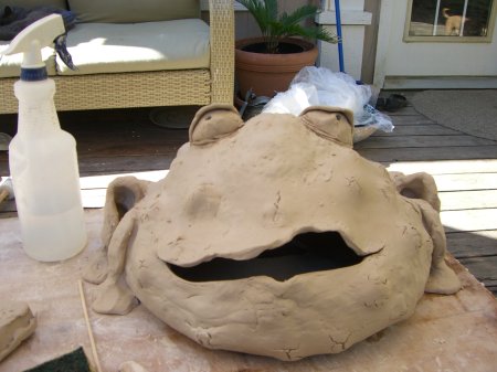 unglazed toad sculpture by pamela