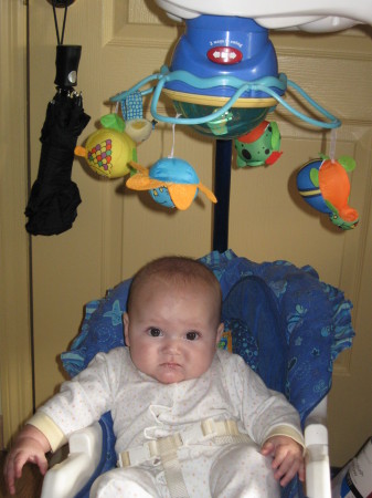 Dorothy sitting up in her swing