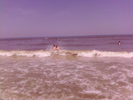 Joe and David braving the waves