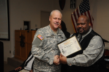 Receiving the award from the 2 star General