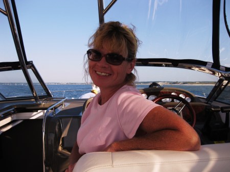 Tara Donahoe Clair on her boat (37 Regal)!