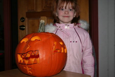 Lia with her first carved Jack O'Lantern