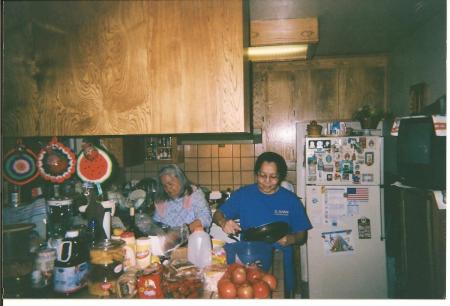 Mom,'s and sister Yolanda burning-up the stove