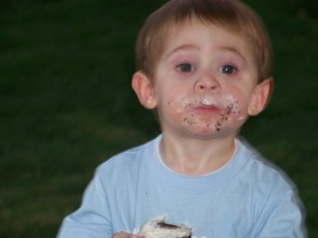 RJ eating a cupcake