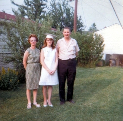 mom, me, dad back yard 1968