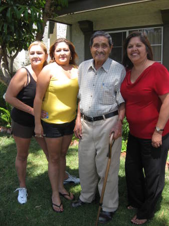 My Sisters & me with our Dad.