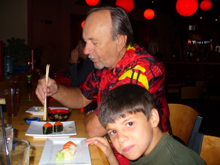 Dad and Sean eating Sushi in Vegas